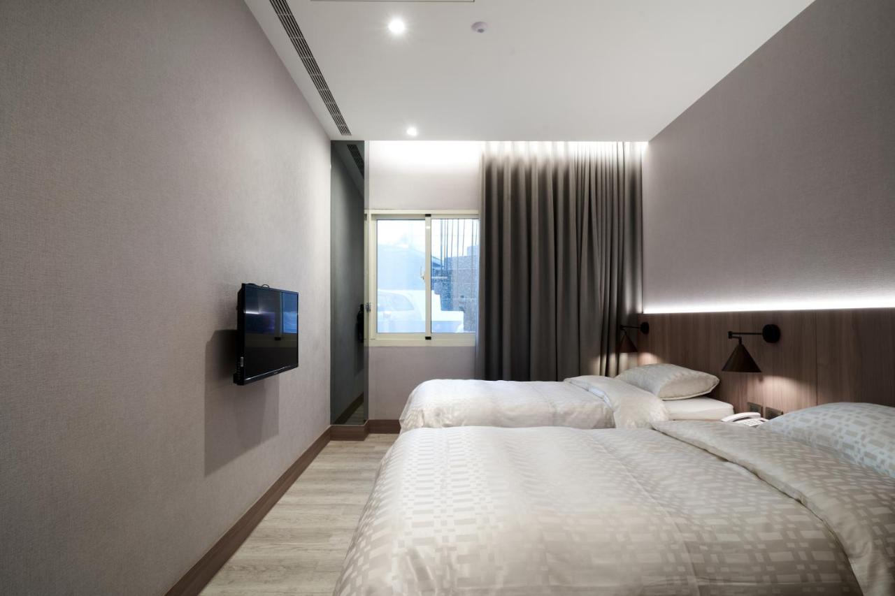 Yung An Business Hotel Dounan Exterior photo